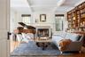 Living area featuring beam ceiling, a healthy amount of sunlight, and coffered ceiling