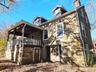 Stone House, front porch, basement entrance & door to storage room under porch