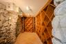 Wine Cellar & Hidden Tasting Room behind door.