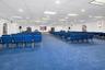 Misc room featuring carpet flooring, recessed lighting, and arched walkways