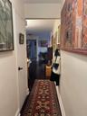 Corridor with dark wood-type flooring