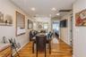 Dining space featuring light wood-type flooring, recessed lighting, attic access, and cooling unit