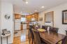 Dining space featuring light wood-style floors, recessed lighting, and cooling unit