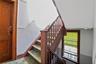 Stairway featuring concrete floors