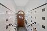 Entryway with tile walls