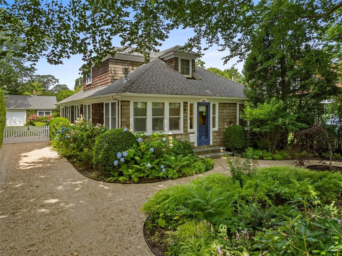 Shingle-style home with a shingled roof