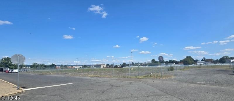Devlp  land behind property