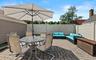 Fenced backyard featuring outdoor dining area, a patio, and outdoor lounge area