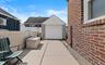Garage featuring driveway