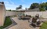 Fenced backyard featuring a patio area and outdoor dining space