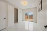 Empty room featuring light marble finish flooring and recessed lighting