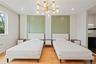 Bedroom with ornamental molding, light wood-type flooring, a chandelier, recessed lighting, and radiator