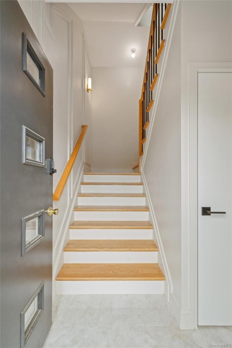 Stairway with tile patterned floors