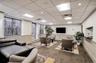 Building lobby with a paneled ceiling and recessed lighting