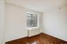 Spare room with radiator and baseboards