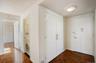 Entrance foyer featuring a textured ceiling and baseboards