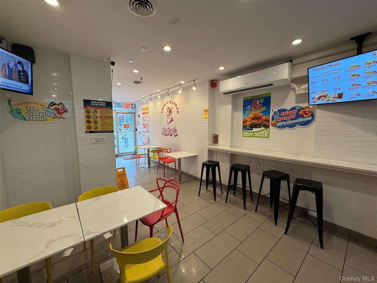 Playroom featuring track lighting, a wall unit AC, recessed lighting, and tile patterned floors