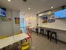 Playroom featuring track lighting, a wall unit AC, recessed lighting, and tile patterned floors