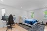 Bedroom featuring multiple windows, wood finished floors, and recessed lighting