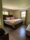 Bedroom with walk in closet