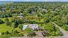 Aerial overview of property's location with a pool area