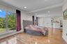 Upper Level Bedroom(Can Be Primary) with ornamental molding, wood finished floors, and recessed lighting