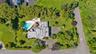 Aerial view of house with a pool area