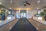 Reception featuring wallpapered walls, a textured ceiling, ceiling fan, recessed lighting, and french doors