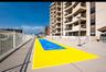 View of property's community with shuffleboard