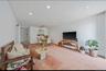 Carpeted living area featuring recessed lighting and ceiling fan