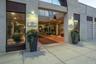 Entrance to property featuring stucco siding