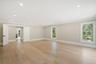 Unfurnished room featuring crown molding, plenty of natural light, light wood finished floors, and recessed lighting