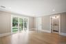 Unfurnished bedroom with light wood-type flooring, recessed lighting, access to outside, and crown molding