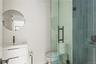 Full bathroom with a stall shower and vanity