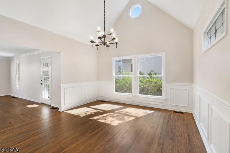 Dining room w/ vaulted ceiling