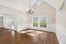 Dining room w/ vaulted ceiling