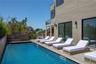 Swimming pool featuring a deck and a balcony