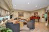 Living room featuring plenty of natural light, recessed lighting, and hardwood / wood-style floors