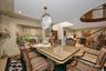 Dining room with recessed lighting, stairway, and light wood finished floors