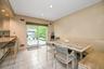 Dining space featuring recessed lighting and light tile patterned flooring