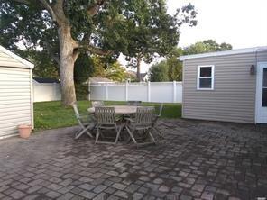 View of patio / terrace with fence and outdoor dining area