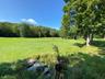 View of grassy yard with a view of countryside