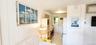 Corridor with an AC wall unit and wooden walls
