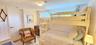 Bedroom featuring wood walls