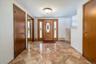 Entrance Foyer featuring marble tiled floors.
