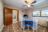 Comfortable Eat-in Kitchen with Ceiling Fan.