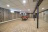Full Finished Basement with High Ceilings and multiple Storage Rooms.