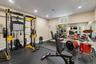 Workout area featuring recessed lighting
