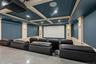 Cinema featuring crown molding, a decorative wall, recessed lighting, and beamed ceiling
