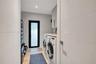 Full Size laundry room with storage and server/brain for home smart system